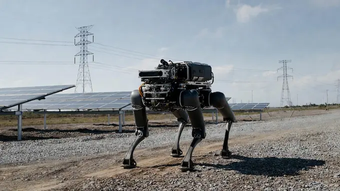  A four-legged D5-style inspection robot patrolling an outdoor industrial site for Weekly Robotics News.