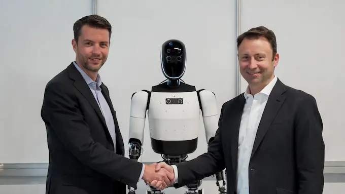 Robotics partnership announcement with humanoid robot.